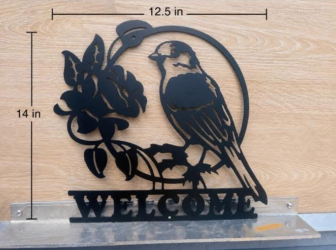 Welcome sign with Cardinal and flowers