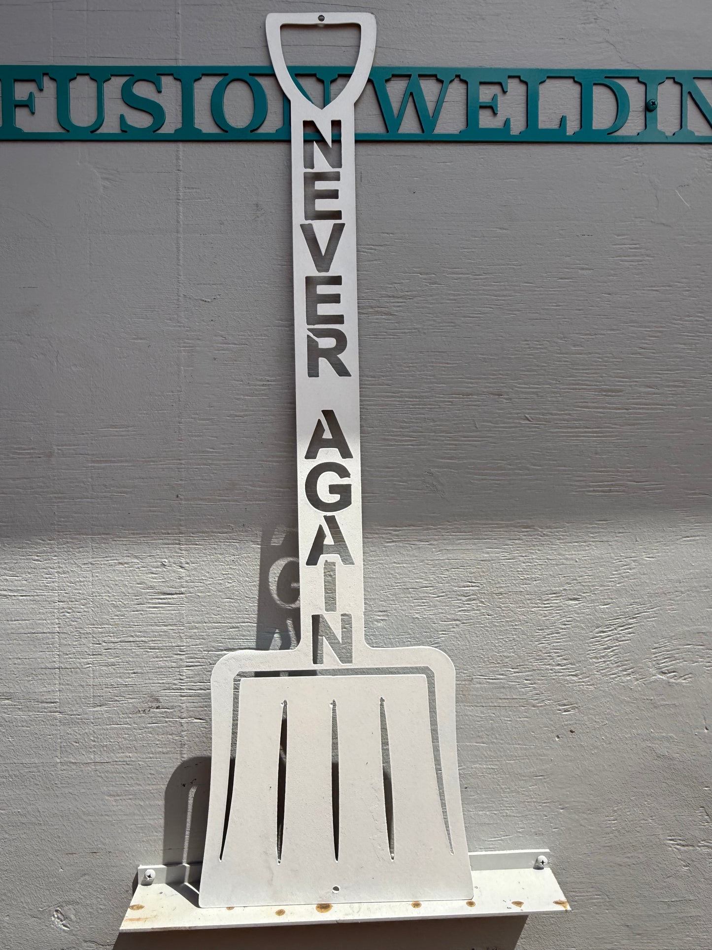 Never Shovel Again Sign