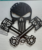 Skull with pistons Sign